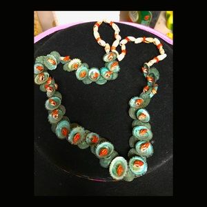 Multiple types of shells necklace, limpits & more